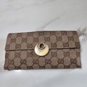 Gucci Brown Monogram Clutch